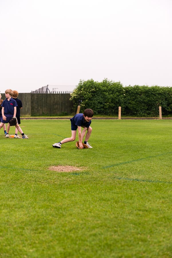 Little league infliender in ground ball drill