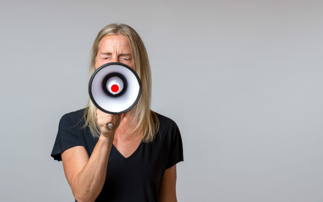 woman using bullhorn to give instructions