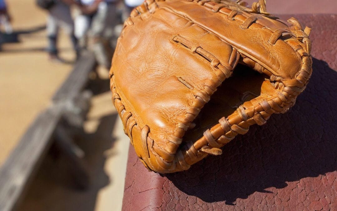 baseball glove sitting on roof